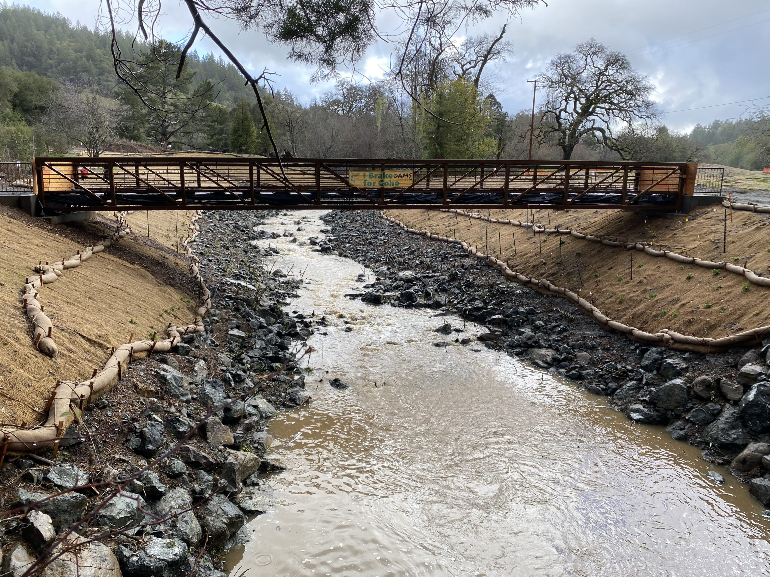 New Pedestrian Bridge Connects Community to Trails on Former Golf Course